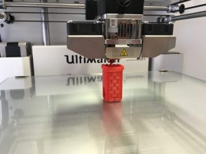 A 3D Printer Printing a figuring for a D&D Set