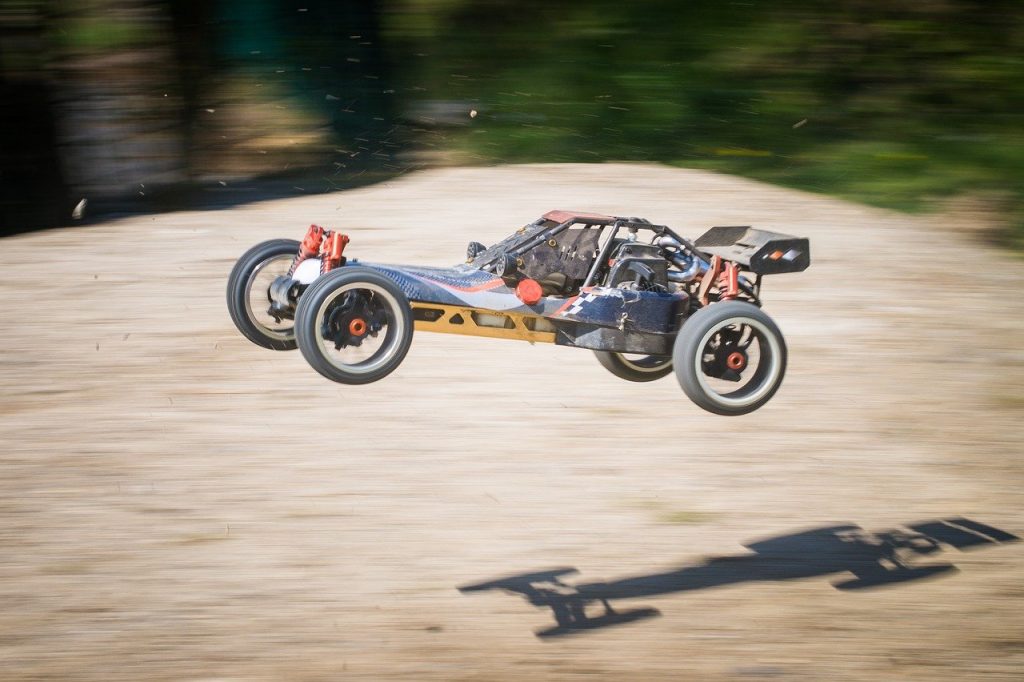 3d-print-rc-car a customer's RC car with 3D Printed Car Parts doing jumps on a dirt course